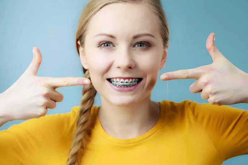 braces wire embedded in gums.. what do i do? : r/braces
